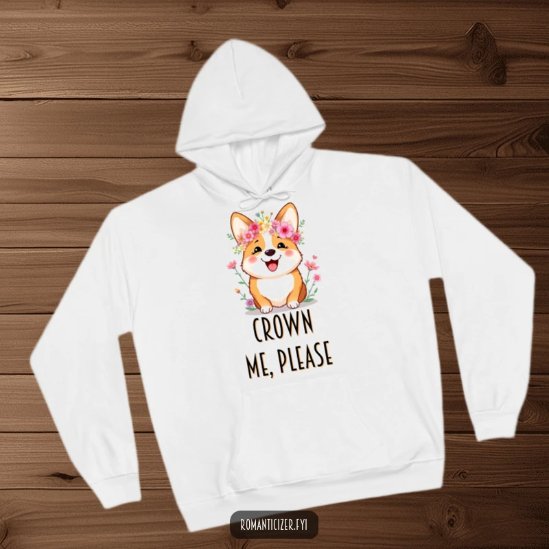 Funny Hoodie featuring a joyful corgi smiling sweetly while wearing a vibrant crown of wildflowers, providing cozy comfort and humor.