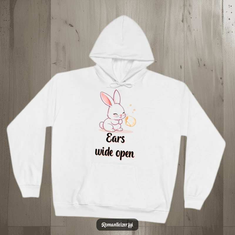 Funny Rabbit Hoodie showcasing a curious rabbit listening with delight to a whispering seashell, cozy and charming.