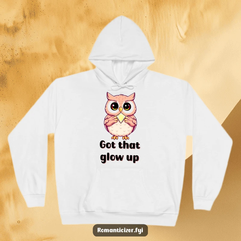 Funny hoodie depicting a happy owl presenting a sparkling jewel with pride, symbolizing wisdom and valuable finds.