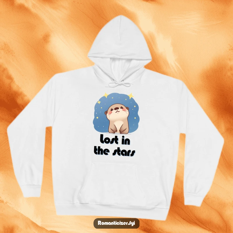 Funny otter hoodie with a giggling creature gazing at a starry night sky, perfect for cozy, wonder-filled evenings. Cute gift.