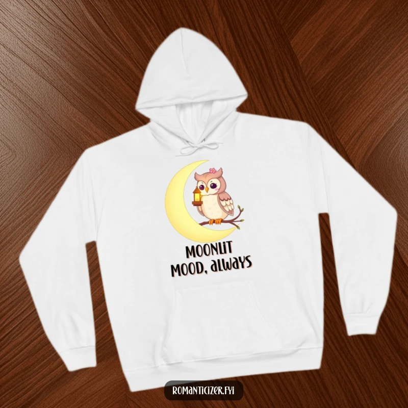 Funny hoodie featuring a romantic owl on a crescent moon, holding a glowing lantern, offering warm, enchanting comfort.