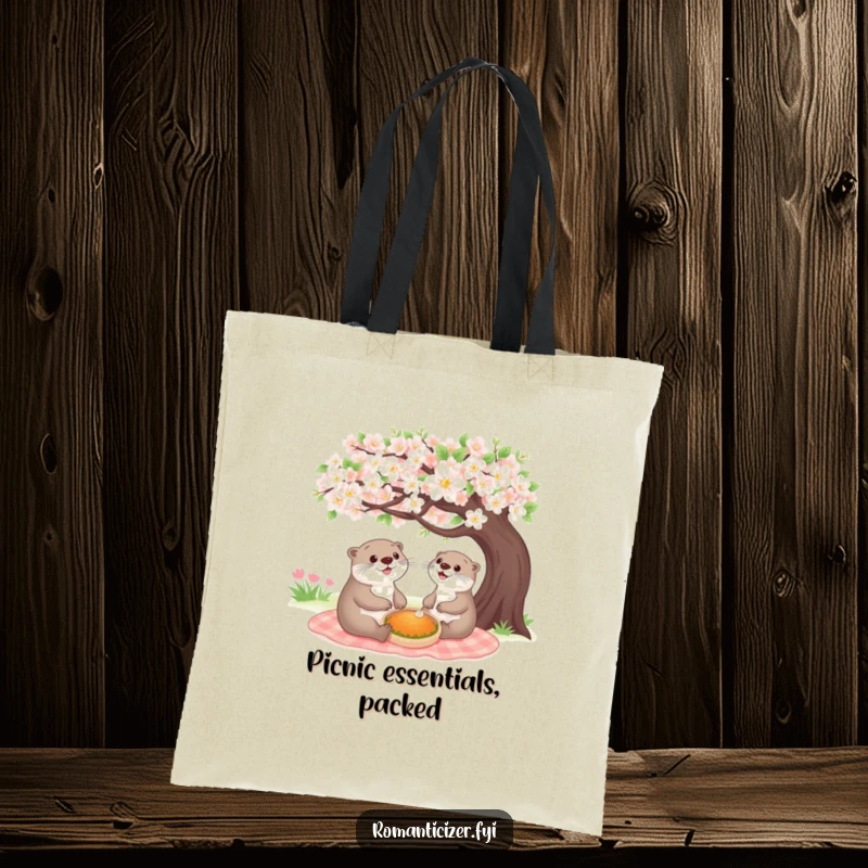 Funny cheerful otter tote bag featuring a happy animal sharing a picnic under a blooming tree, ideal for carrying items with a smile.